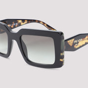 Prada Eyewear Sunglasses - Black | 4dcf2bbd8f4ada4565a4ac16ca4359c69c6ad409