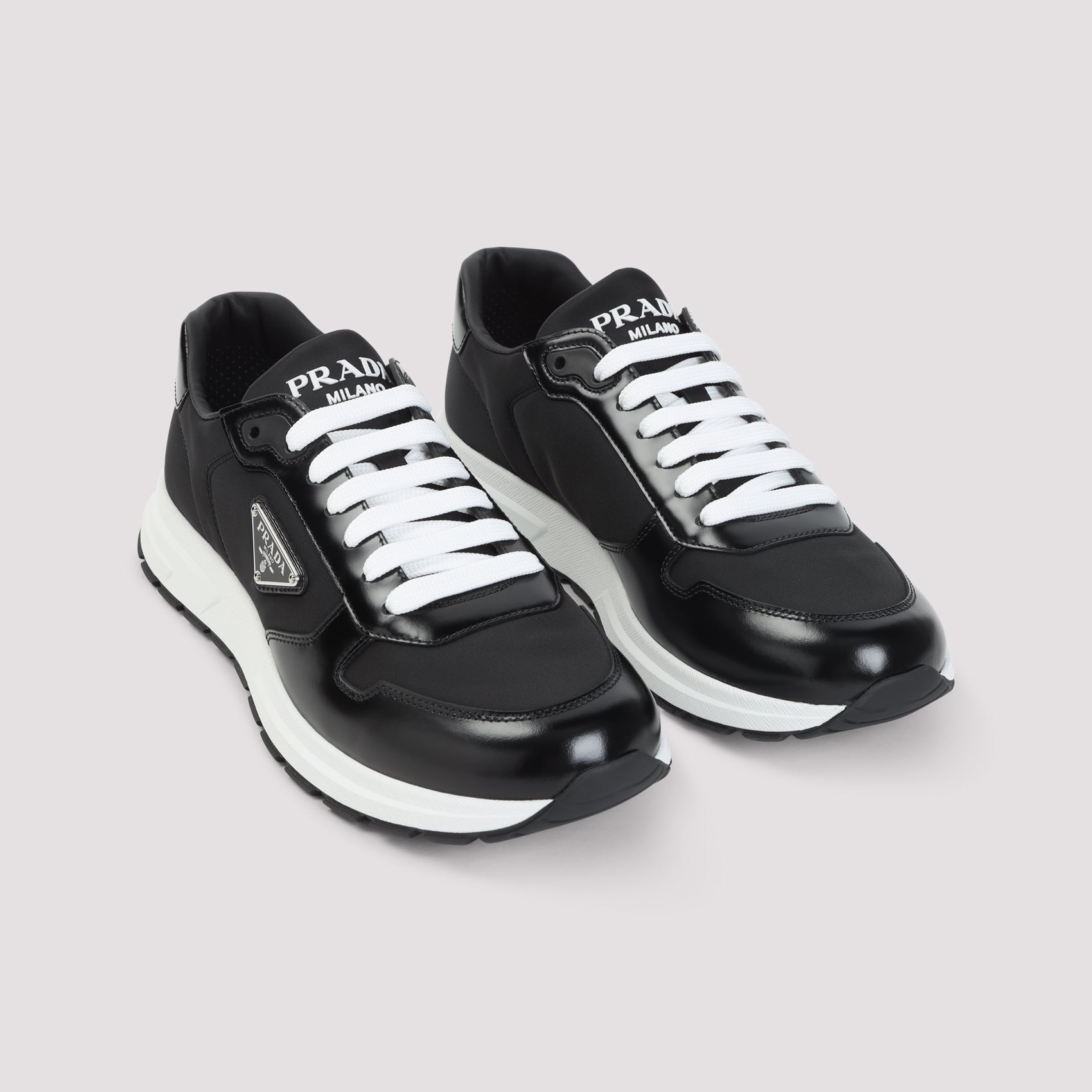 Prada Sneakers - Black | 8161957eec1c611a2afed97133352f231b0ad2ca