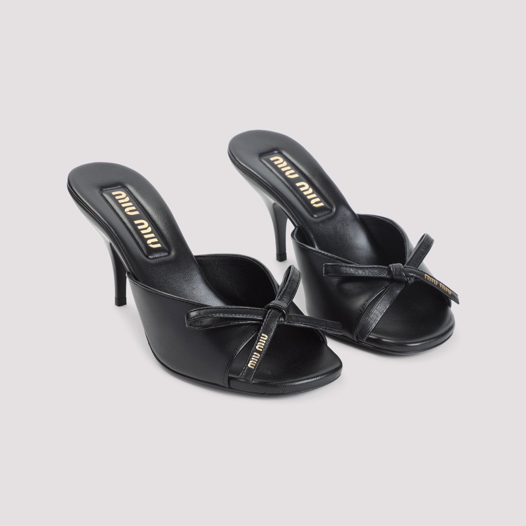 Miu Miu Slippers - Black | 00fcd5a71ffd63bb456d99d7ed9a0a097e7156c9