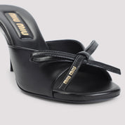 Miu Miu Slippers - Black | e59333d6f141275591192e4911193850184842c6
