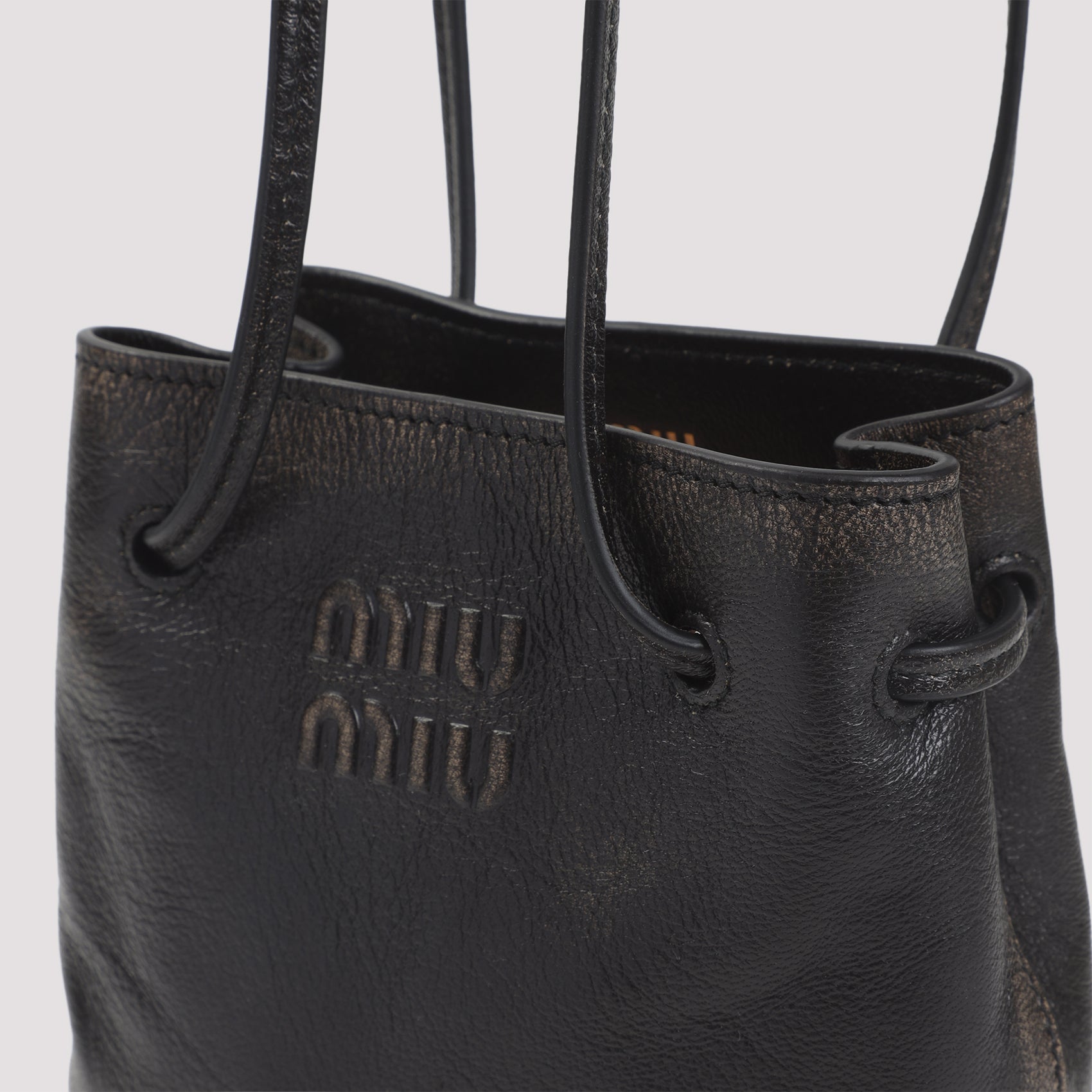 Miu Miu Pouch - Brown | dea7258291f37d750e206e58f5528cebba9e0bb6