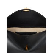 Toteme T-Lock leather clutch Bag